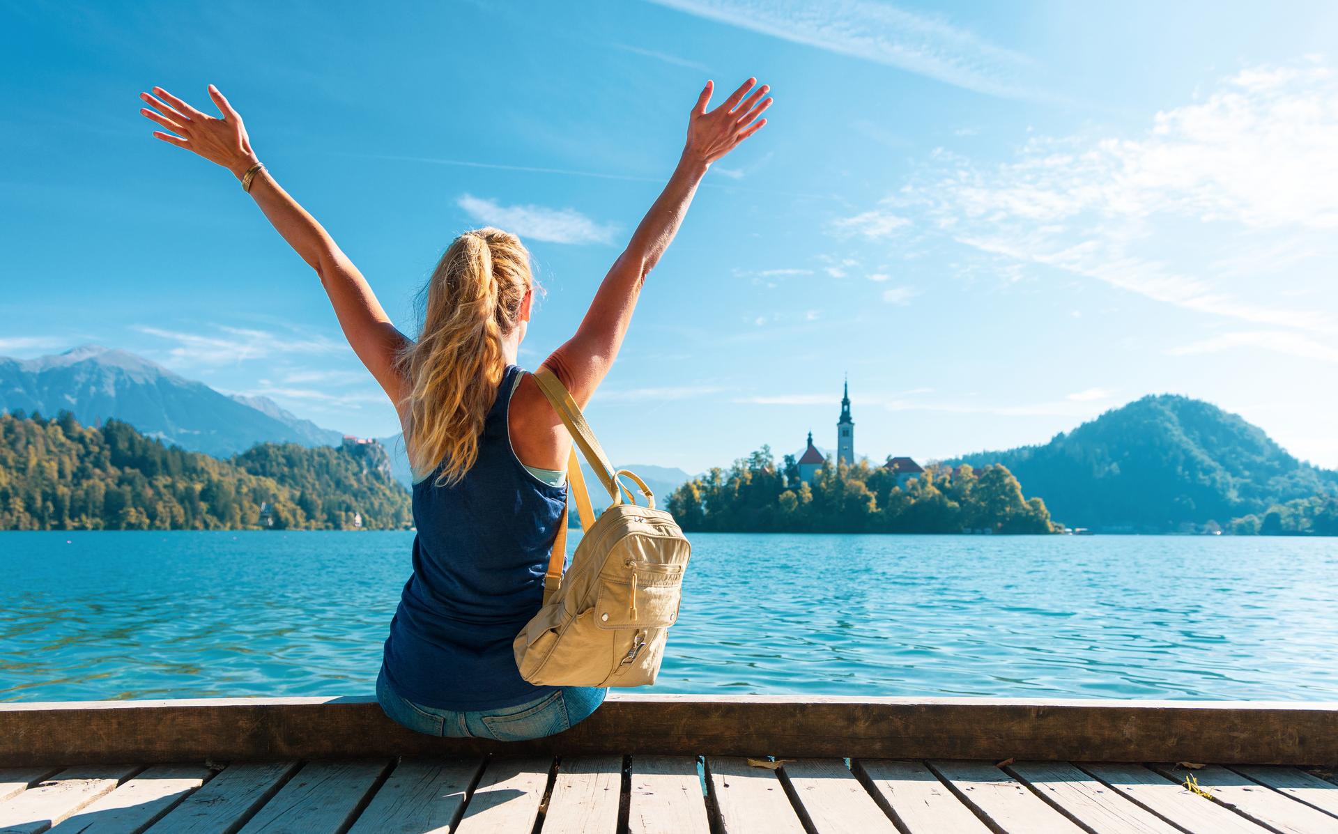 woman-enjoying-lake-bled-in-summer