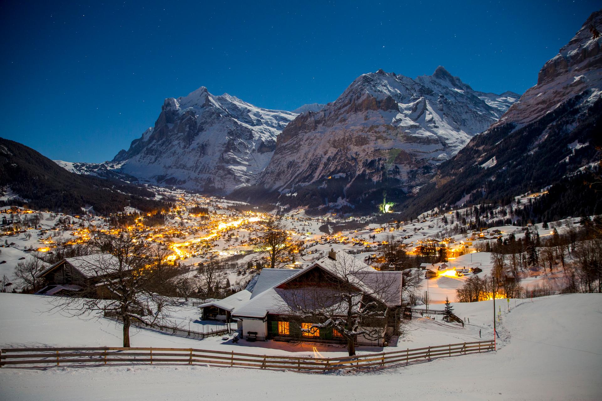 Snowy picturesque ski resort of Grindelwald at night